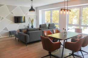 New York Apartment - für Freunde & Familien, stadtnah, Parkplatz, E-Ladestation, Gitterbox für Fahrräder, Fitnessstudio, digitale Gästemappe mit Restaurant- und Unternehmenstipps